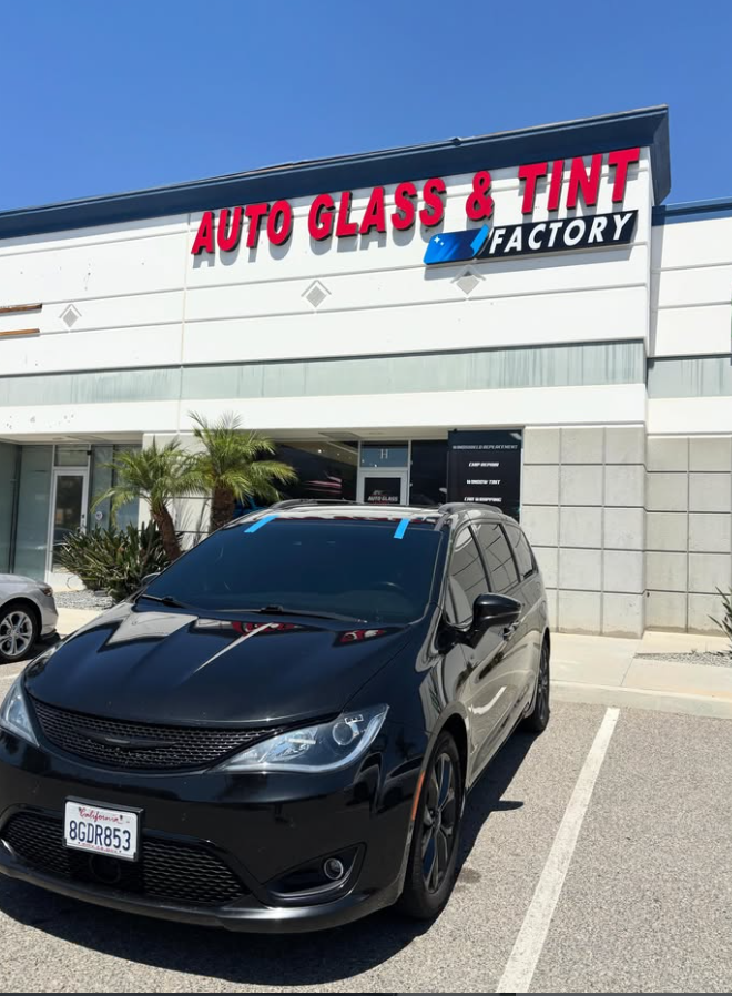 Black Chrysler Pacifica with tinted windows